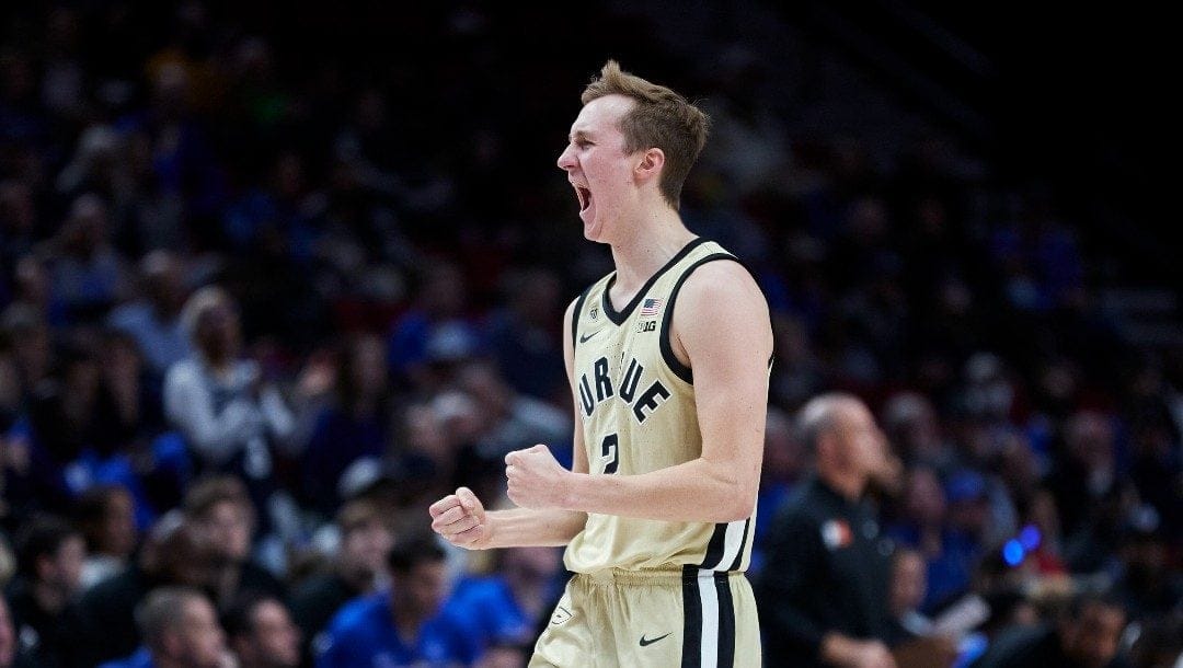 Purdue guard Fletcher Loyer clenches his fists after scoring against Duke during the first half of an NCAA college basketball game in the Phil Knight Legacy Championship in Portland, Ore., Sunday, Nov. 27, 2022.