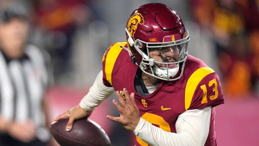 Southern California quarterback Caleb Williams runs the ball during the first half of an NCAA college football game against Notre Dame Saturday, Nov. 26, 2022, in Los Angeles.