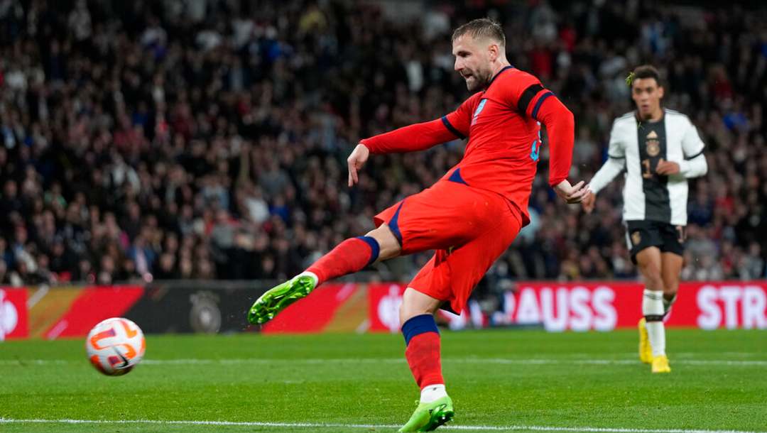 England's Luke Shaw scores his side's opening goal during the UEFA Nations League soccer match between England and Germany at the Wembley Stadium in London, England, Monday, Sept. 26, 2022.