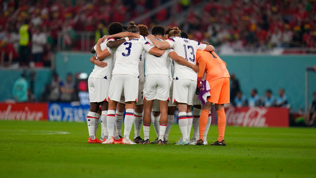 American players huddle before the World Cup, group B soccer match between the United States and Wales.