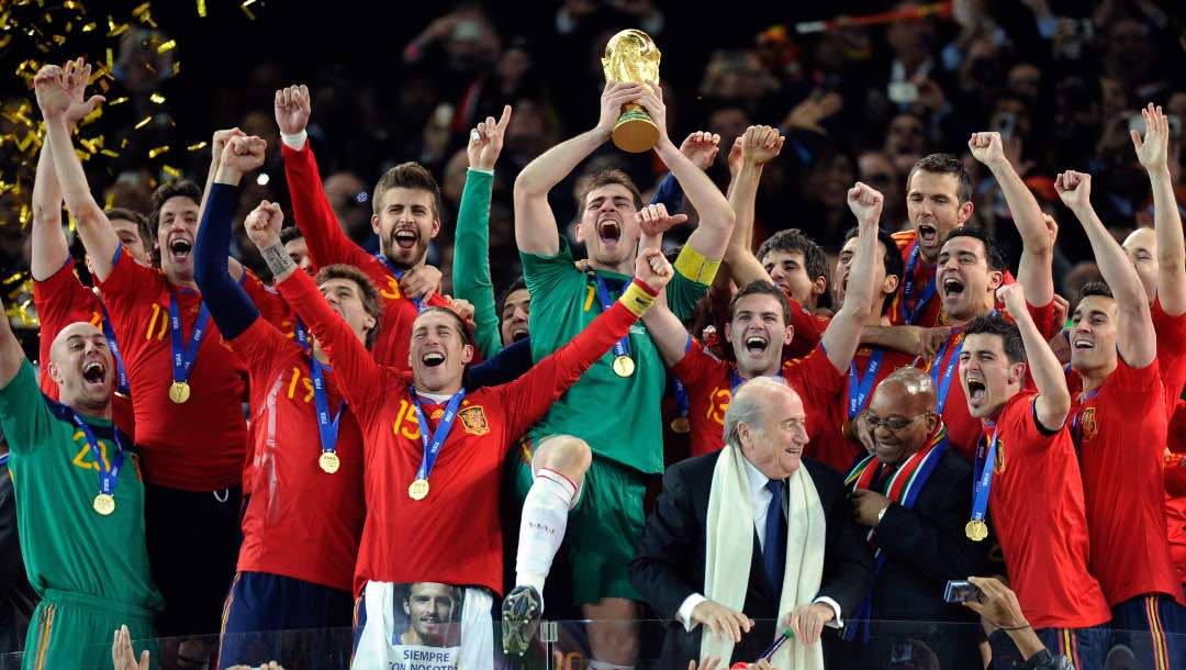 Spain goalkeeper Iker Casillas holds up the trophy after winning the World Cup final soccer match between the Netherlands and Spain at Soccer City in Johannesburg, South Africa.