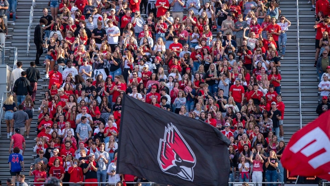 Ball State University fans watch as the team runs onto the field before an NCAA football game against Western Illinois, on Thursday, Sept. 2, 2021, in Muncie, Ind. (AP Photo/Doug McSchooler)