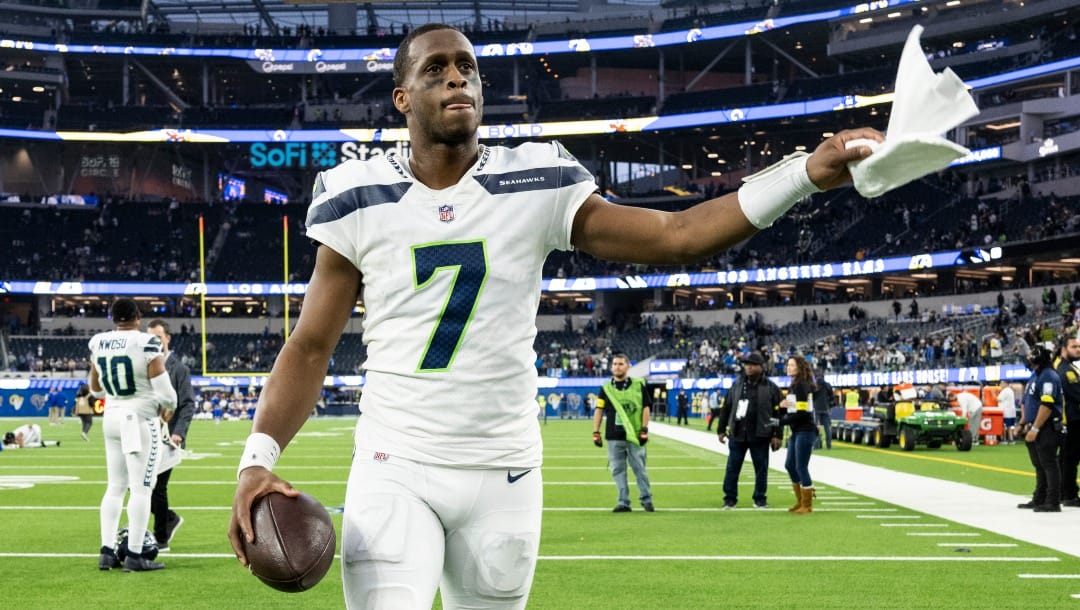 Seattle Seahawks quarterback Geno Smith (7) waves towards the crowd after an NFL football game against the Los Angeles Rams, Sunday, Dec. 4, 2022, in Inglewood, Calif. (AP Photo/Kyusung Gong)