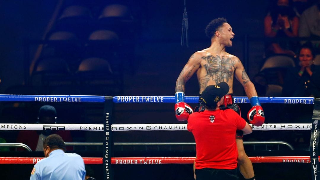 Prograis celebrates his win over Juan Heraldez during the third round of their super lightweight boxing bout.