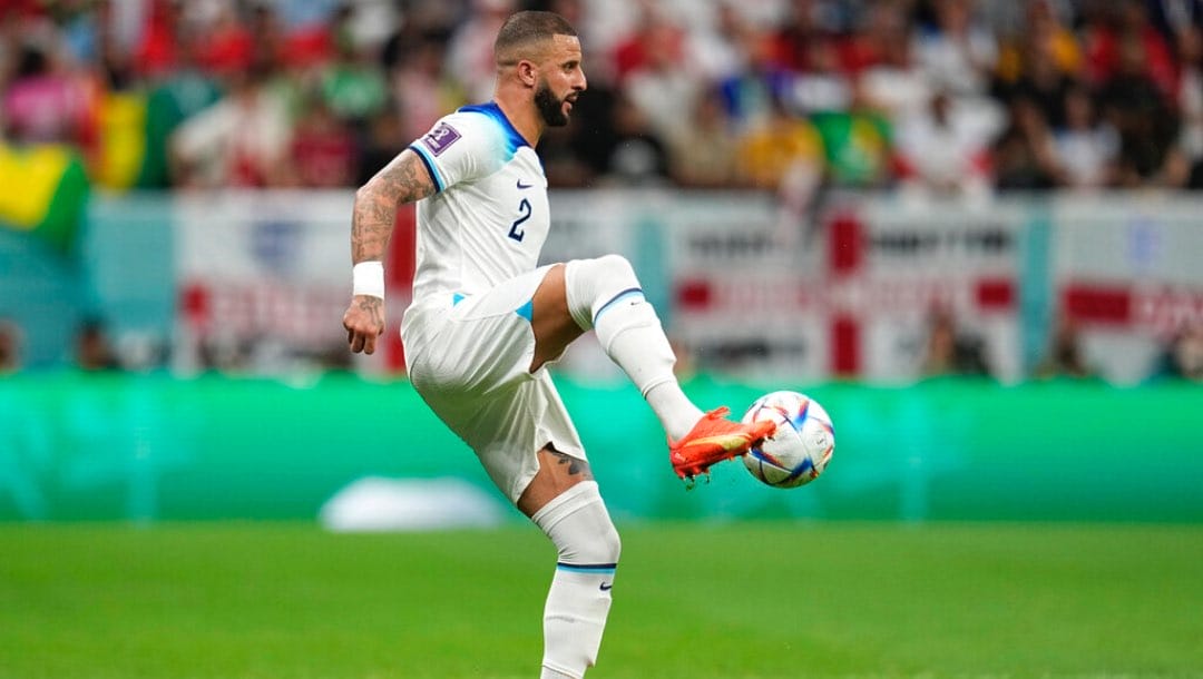 England's Kyle Walker controls the ball during the World Cup round of 16 soccer match between England and Senegal, at the Al Bayt Stadium in Al Khor, Qatar, Sunday, Dec. 4, 2022.