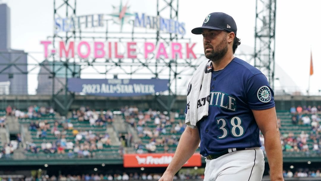 Seattle Mariners starting pitcher Robbie Ray walks to the dugout at T-Mobile Park before a baseball game against the New York Yankees, Wednesday, Aug. 10, 2022, in Seattle.
