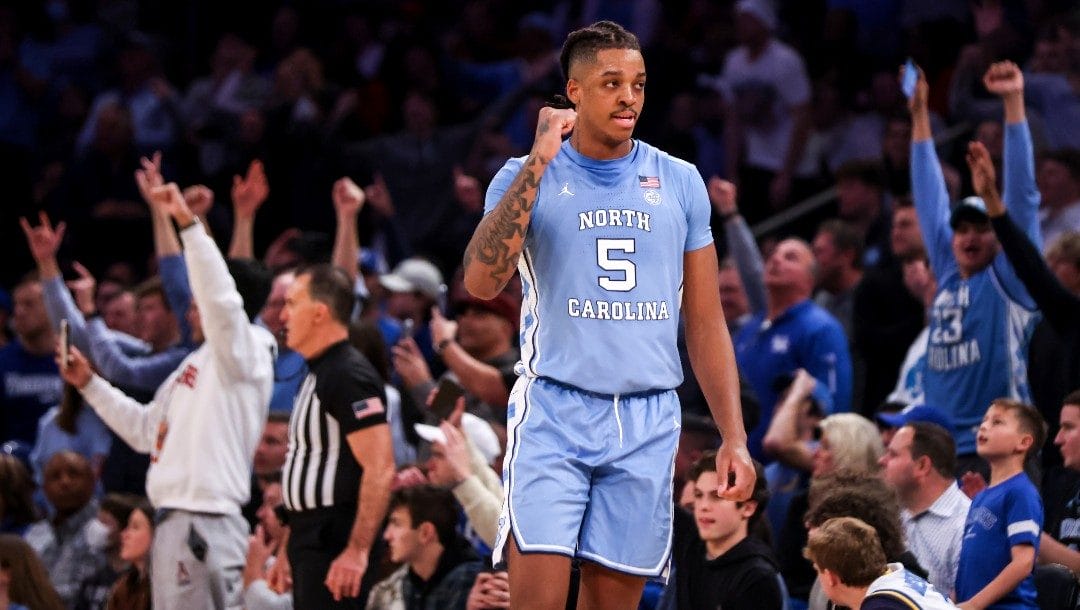 North Carolina forward Armando Bacot celebrates after beating Ohio State an NCAA college basketball game in the CBS Sports Classic, Saturday, Dec. 17, 2022, in New York. The Tar Heels won 89-84 in overtime.