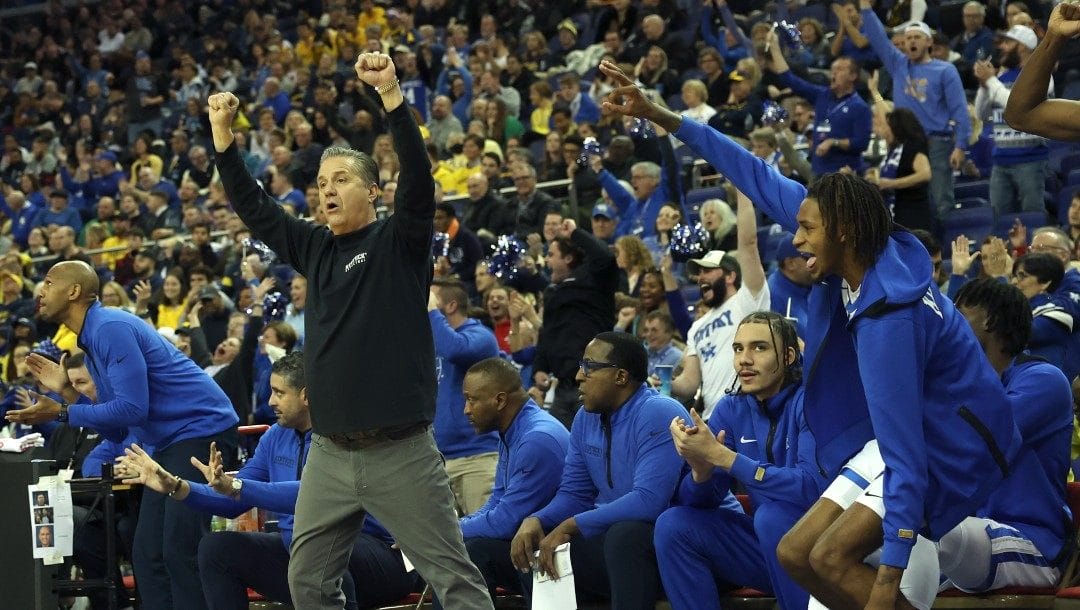 Kentucky Wildcats' head coach John Calipari reacts during an NCAA basketball game between Michigan Wolverines and Kentucky Wildcats at the O2 Arena, in London, Sunday, Dec.4, 2022.