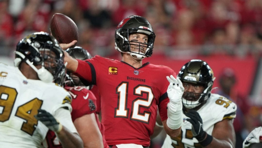 Tampa Bay Buccaneers quarterback Tom Brady (12) makes a pass attempt during an NFL football game against the New Orleans Saints, Monday, Dec. 5, 2022, in Tampa, Fla.