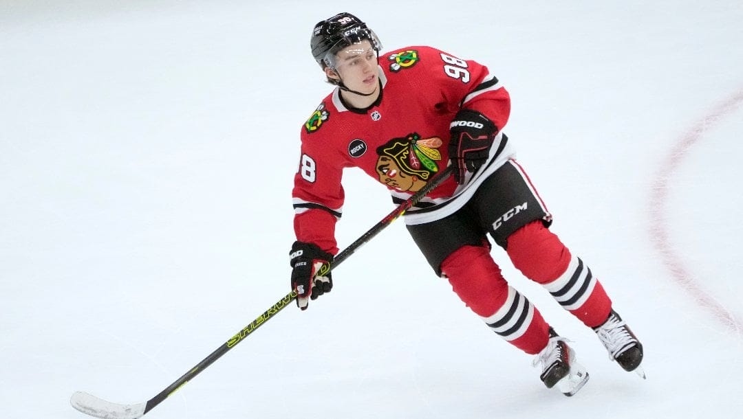 Chicago Blackhawks center Connor Bedard turns on his skates during an NHL preseason hockey game against the Detroit Red Wings Tuesday, Oct. 3, 2023, in Chicago.