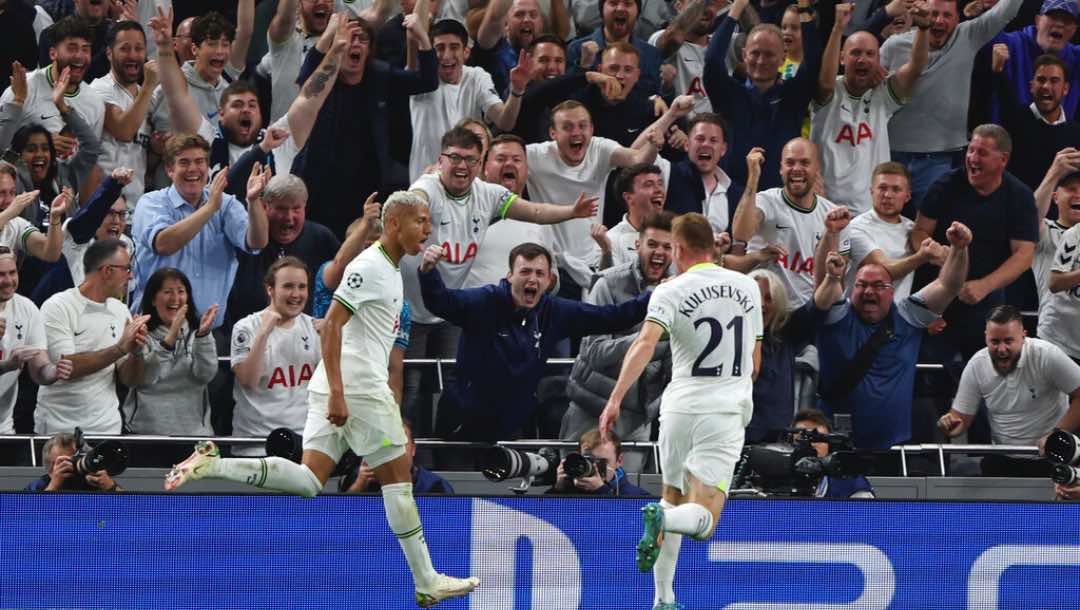 Tottenham's Richarlison, left, celebrates after scoring his side's second goal during the Champions League soccer match between Tottenham Hotspur and Olympique de Marseille at Tottenham Hotspur stadium, in London, England, Wednesday, Sept. 7, 2022.