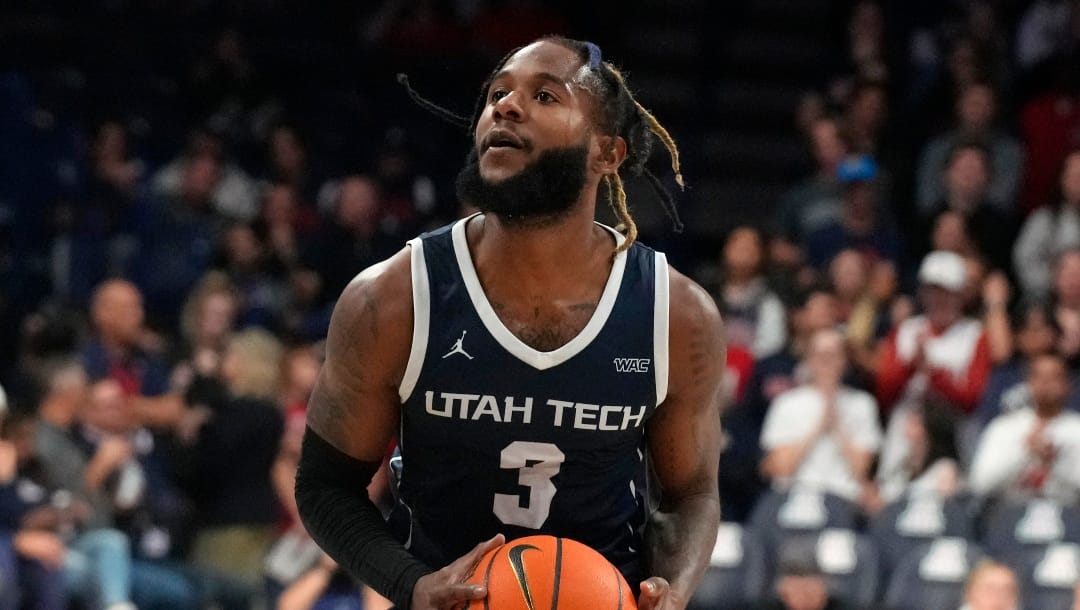 Utah Tech guard Cameron Gooden (3) during the first half of an NCAA college basketball game against Arizona, Thursday, Nov. 17, 2022, in Tucson, Ariz. (AP Photo/Rick Scuteri)