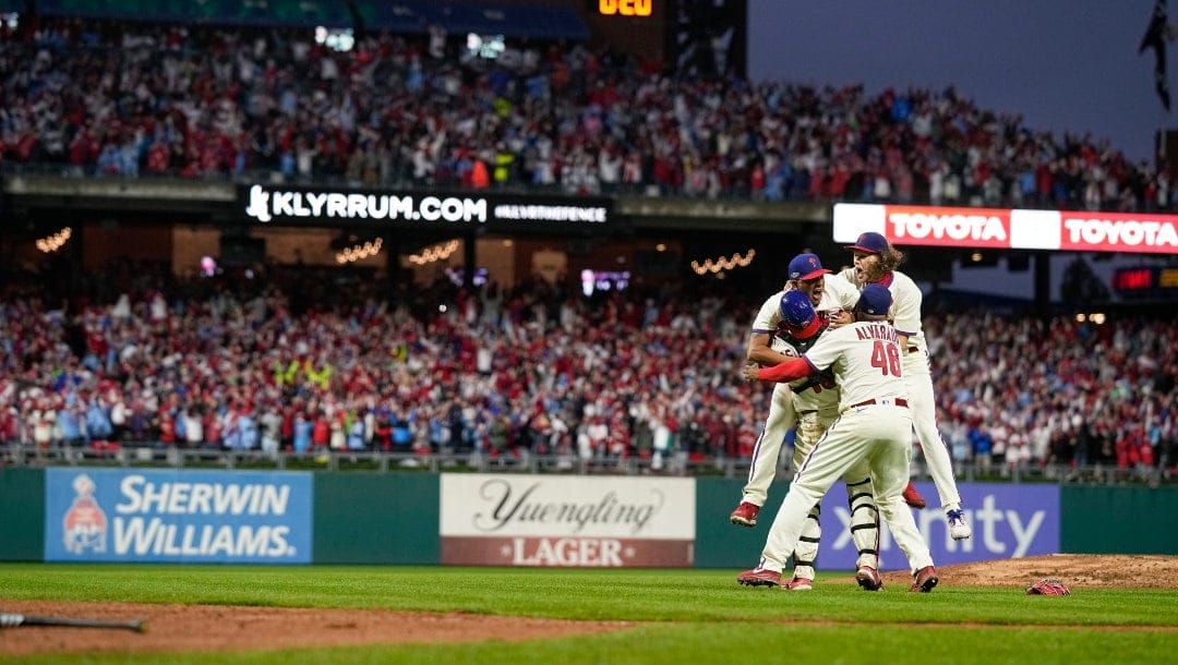 The Philadelphia Phillies celebrate after winning the baseball NL Championship Series against the San Diego Padres in Game 5 on Sunday, Oct. 23, 2022, in Philadelphia.
