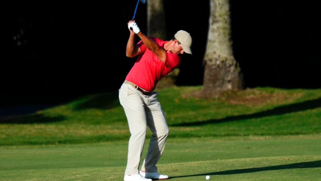 Adam Scott hits from the first fairway during the final round of the Sony Open golf tournament, Sunday, Jan. 15, 2023, at Waialae Country Club in Honolulu.