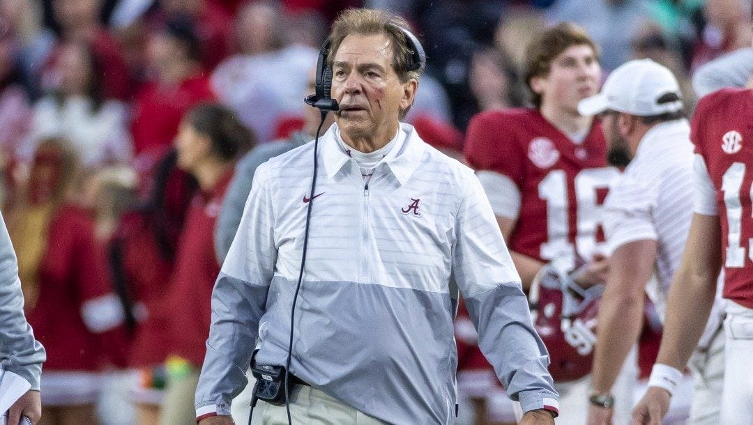 Alabama head coach Nick Saban checks out a call by the referees during the first half of an NCAA college football game against Auburn, Saturday, Nov. 26, 2022, in Tuscaloosa, Ala.