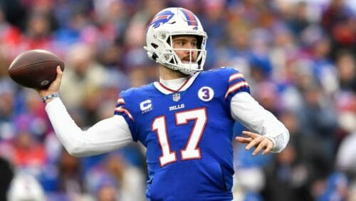 Buffalo Bills quarterback Josh Allen (17) passes during the first half of an NFL football game against the New England Patriots, Sunday, Jan. 8, 2023, in Orchard Park.