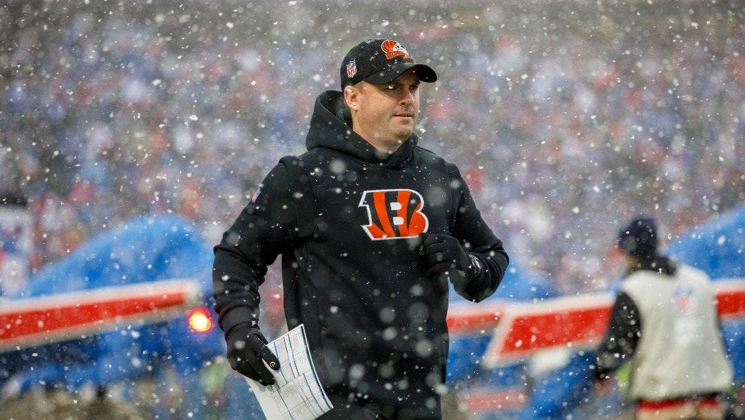 Cincinnati Bengals head coach Zac Taylor runs onto the field before an NFL divisional round playoff football game Sunday, Jan. 22, 2023, in Orchard Park, NY.