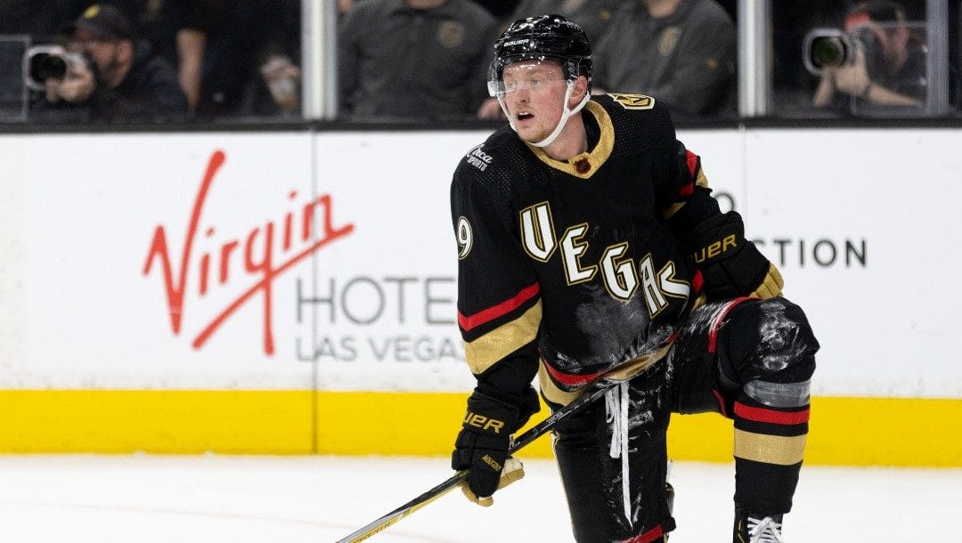 Vegas Golden Knights center Jack Eichel watches the Los Angeles Kings celebrate a goal scored by left wing Kevin Fiala during the third period of an NHL hockey game Saturday, Jan. 7, 2023, in Las Vegas.