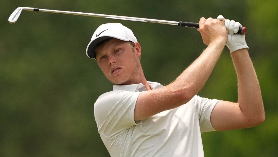 Cam Davis, of Australia, watches his tee shot on the 11th hole during the second round of the PGA Championship golf tournament at Southern Hills Country Club, Friday, May 20, 2022, in Tulsa, Okla.