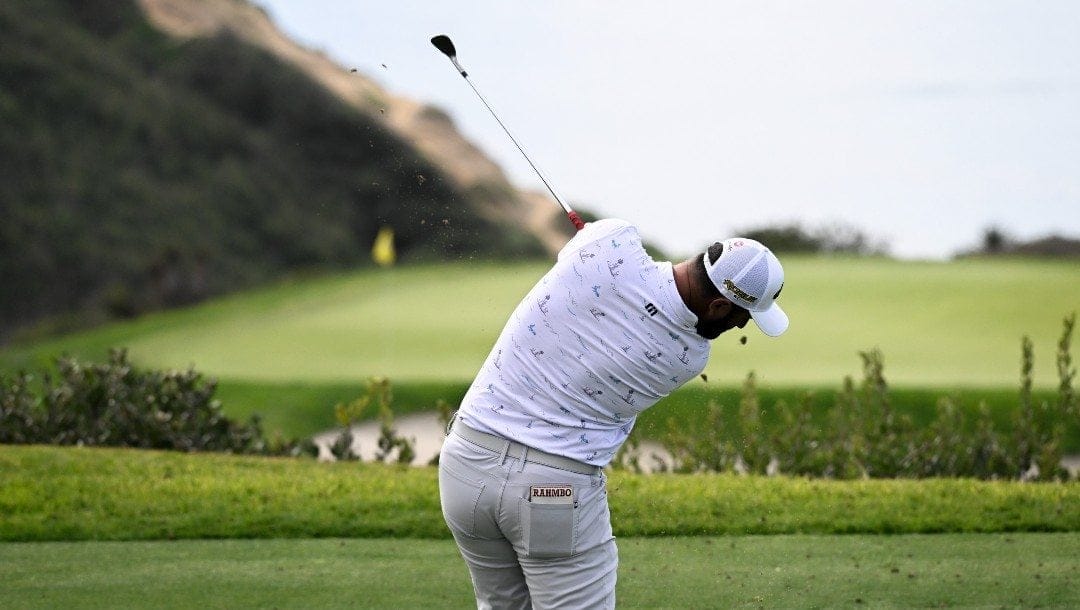 Jon Rahm of Spain hits his tee shot on the third hole of the South Course during the third round of the Farmers Insurance Open golf tournament, Friday Jan. 28, 2022, in San Diego.