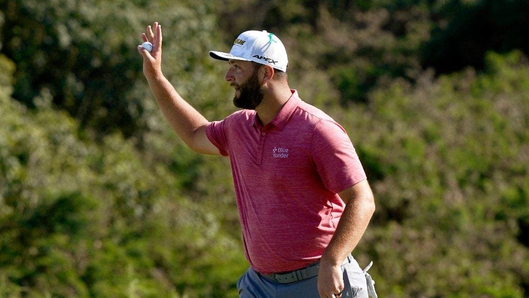 Jon Rahm, of Spain, waves after finishing the final round of the Tournament of Champions golf event, Sunday, Jan. 9, 2022, at Kapalua Plantation Course in Kapalua, Hawaii.