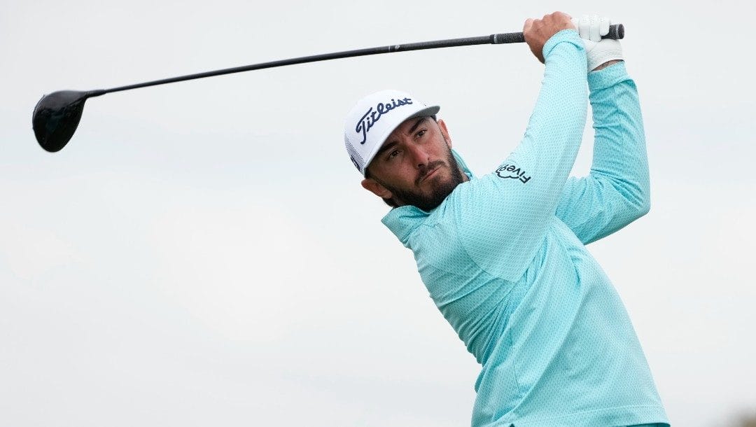 Max Homa watches his tee shot on the second hole of the South Course at Torrey Pines during the final round of the Farmers Insurance Open golf tournament, Saturday, Jan. 28, 2023, in San Diego.