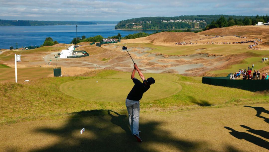 Justin Rose, of England, watches his tee shot on the 14th hole during a practice round for the U.S. Open golf tournament at Chambers Bay on Wednesday, June 17, 2015 in University Place, Wash.