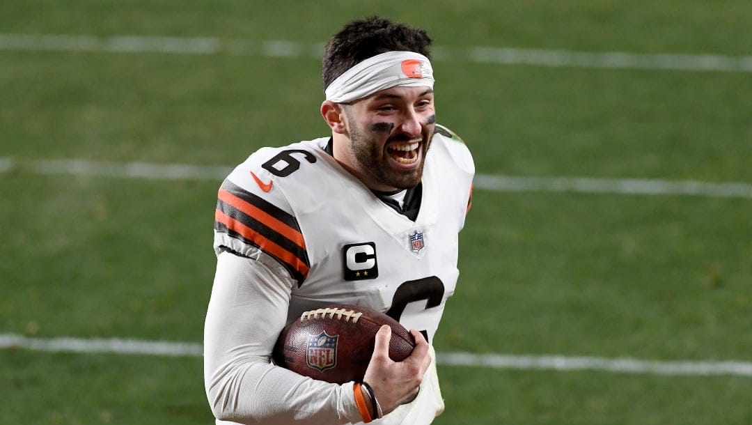 Cleveland Browns quarterback Baker Mayfield (6) reacts as he runs off the field after defeating the Pittsburgh Steelers 48-37 during an NFL wild-card playoff football game, Sunday, Jan. 10, 2021, in Pittsburgh. (AP Photo/Justin Berl)