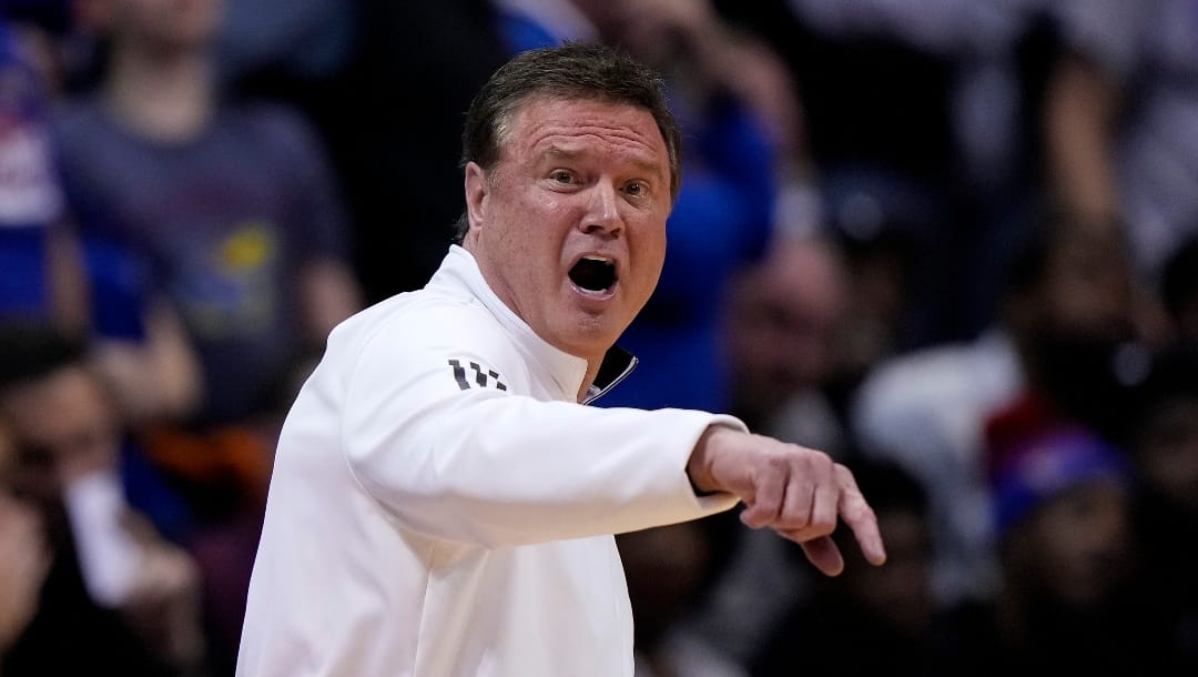 Kansas head coach Bill Self talks to his players during the second half of an NCAA college basketball game against Iowa State Saturday, Jan. 14, 2023, in Lawrence, Kan. Kansas won 62-60 (AP Photo/Charlie Riedel)