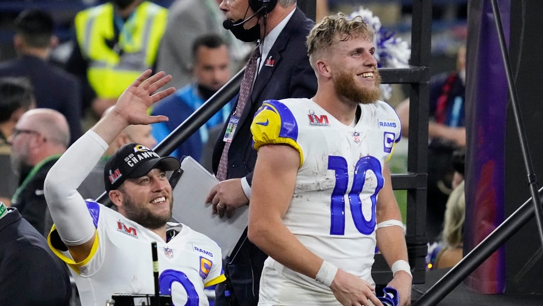 Los Angeles Rams quarterback Matthew Stafford (9) and wide receiver Cooper Kupp (10) look on after the NFL Super Bowl 56 football game Sunday, Feb. 13, 2022, in Inglewood, Calif. The Los Angeles Rams defeated the Cincinnati Bengals 23-20. (AP Photo/Julio Cortez)