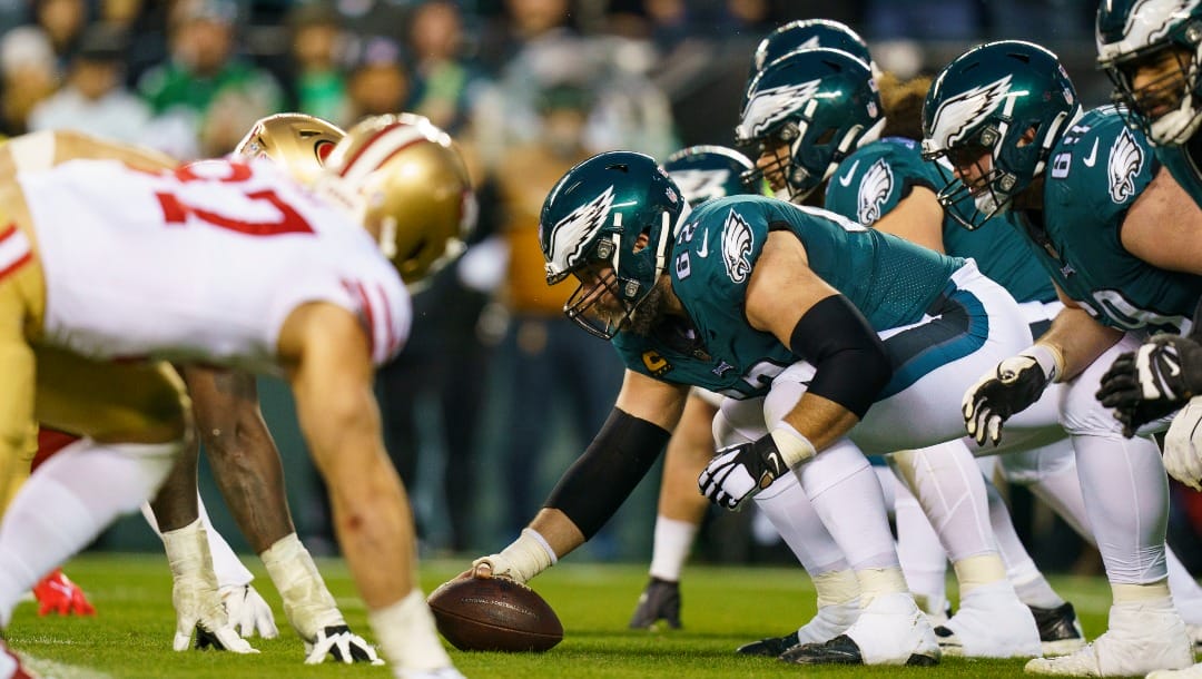 Philadelphia Eagles center Jason Kelce (62) and the Eagles offense lines up against the San Francisco 49ers defense during the NFC Championship NFL football game, Sunday, Jan. 29, 2023, in Philadelphia. (AP Photo/Chris Szagola)