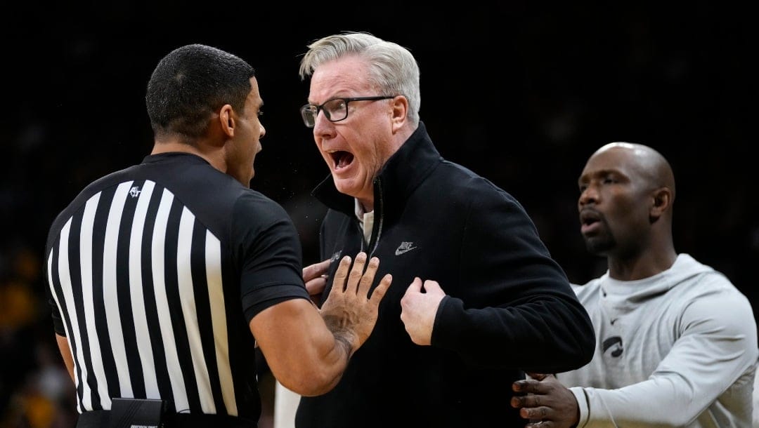 Iowa head coach Fran McCaffery, center, reacts after being called for a technical foul during the first half of an NCAA college basketball game against Indiana, Thursday, Jan. 5, 2023, in Iowa City, Iowa.