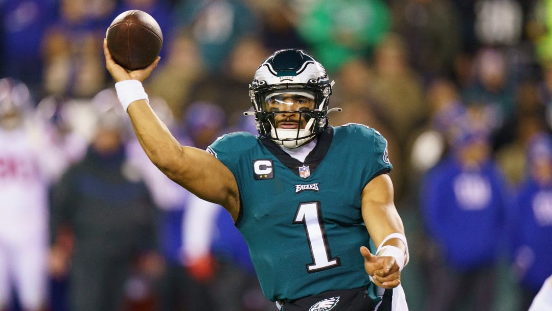 Philadelphia Eagles quarterback Jalen Hurts (1) in action during the NFL divisional round playoff football game against the New York Giants, Saturday, Jan. 21, 2023, in Philadelphia. (AP Photo/Chris Szagola)