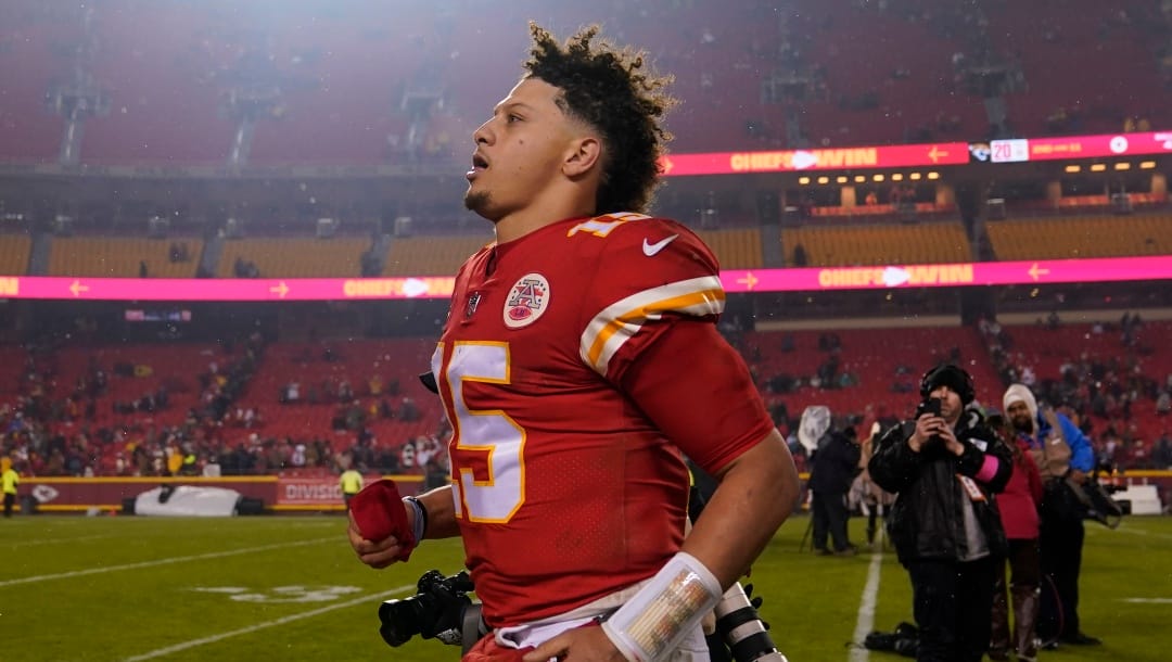 Kansas City Chiefs quarterback Patrick Mahomes (15) leaves the field after an NFL divisional round playoff football game between the Kansas City Chiefs and the Jacksonville Jaguars, Saturday, Jan. 21, 2023, in Kansas City, Mo. The Kansas City Chiefs won 27-20. (AP Photo/Jeff Roberson)