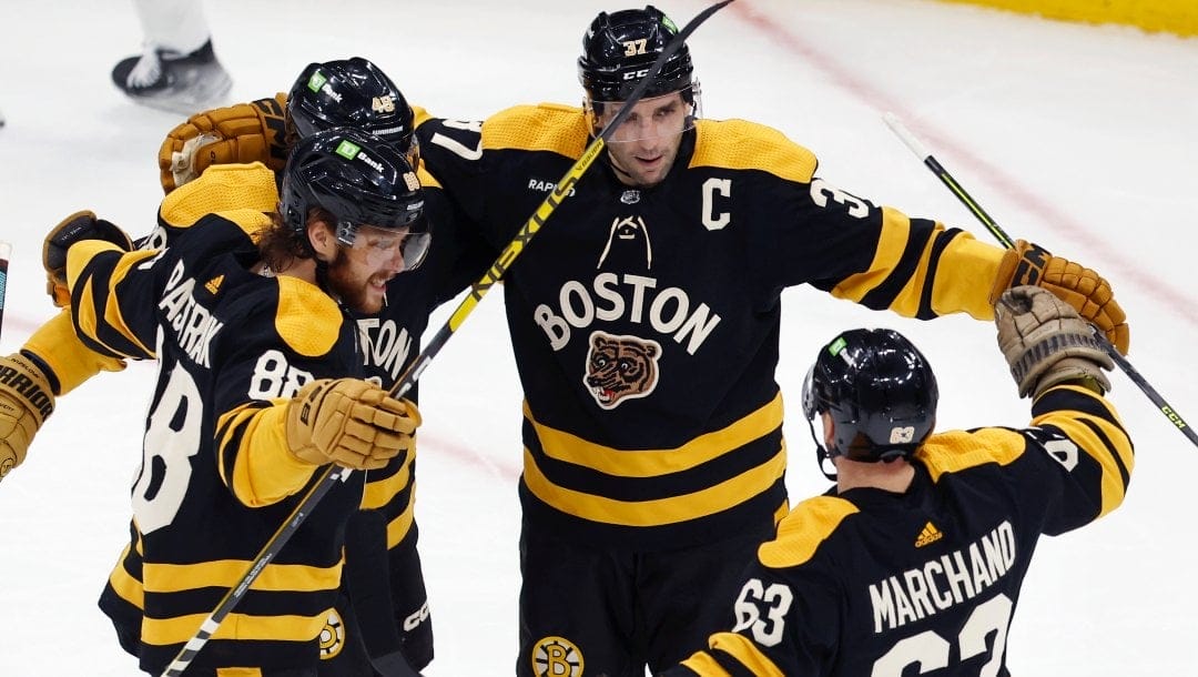 Bruins close out record regular season, beat Canadiens 5-4