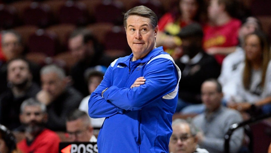 Saint Louis head coach Travis Ford watches play in the second half of an NCAA college basketball game against Maryland, Saturday, Nov. 19, 2022, in Uncasville, Conn.