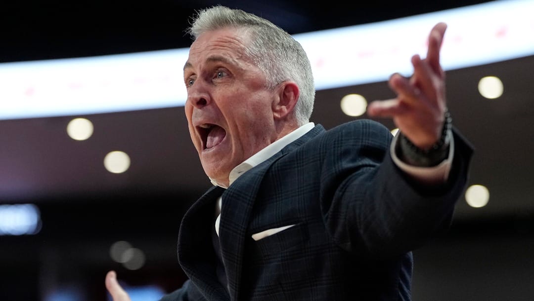 South Florida coach Brian Gregory reacts to a foul call during the first half of an NCAA college basketball game against Houston Wednesday, Jan. 11, 2023, in Houston.