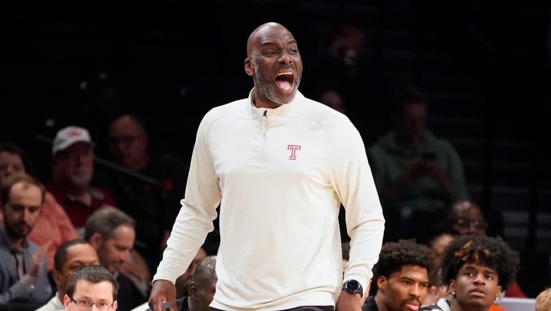 Temple head coach Aaron McKie works the bench in the first half of an NCAA college basketball consolation game against Richmond at the Good Samaritan Empire Classic, Tuesday, Nov. 22, 2022, in New York.