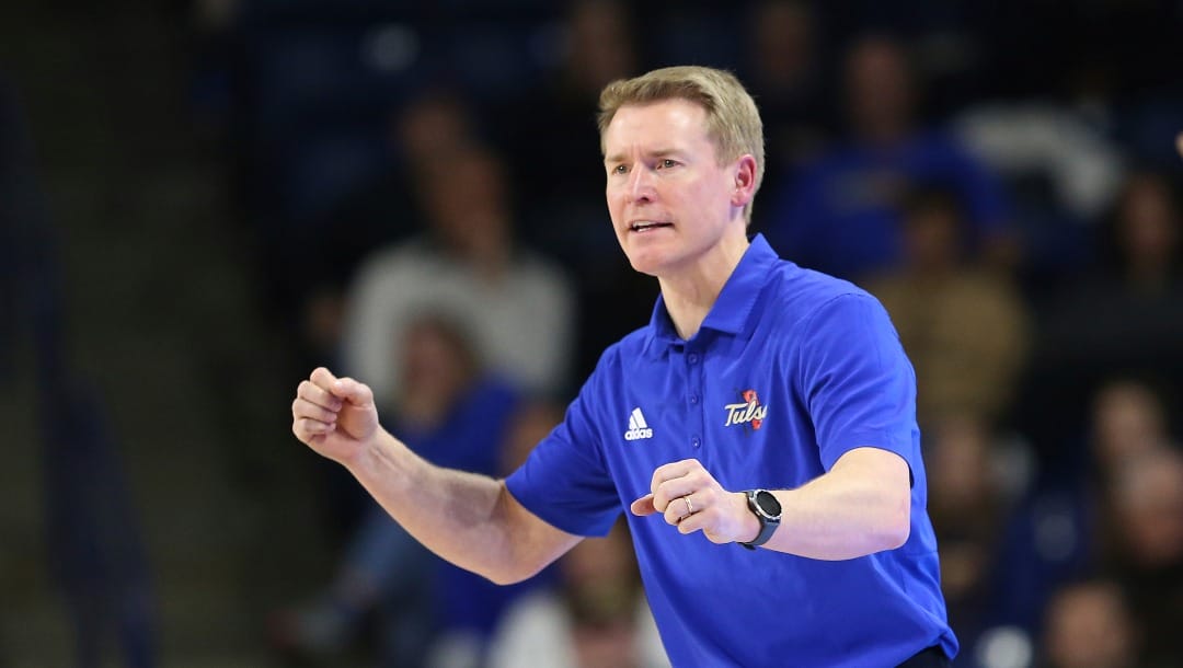 Tulsa head coach Eric Konkol shouts directions to his team during an NCAA college basketball game between Houston and Tulsa on Tuesday, Dec. 29, 2020 in Tulsa, Okla.