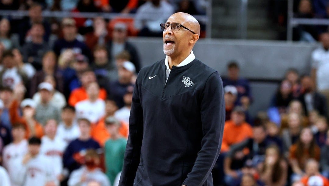 Central Florida head coach Johnny Dawkins reacts to a call during the second half of an NCAA college basketball game against Auburn Wednesday, Dec. 1, 2021, in Auburn, Ala.