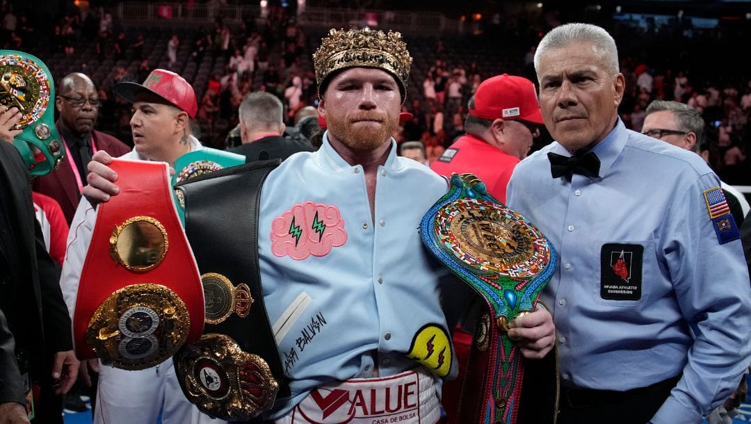 Canelo Alvarez celebrates after defeating Gennady Golovkin in their super middleweight title boxing match, Saturday, Sept. 17, 2022.