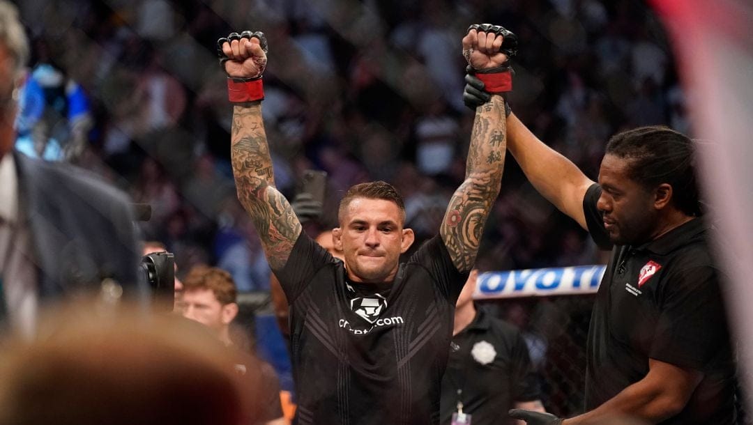 Dustin Poirier is declared the winner after Conor McGregor was injured during a UFC 264 lightweight mixed martial arts bout.