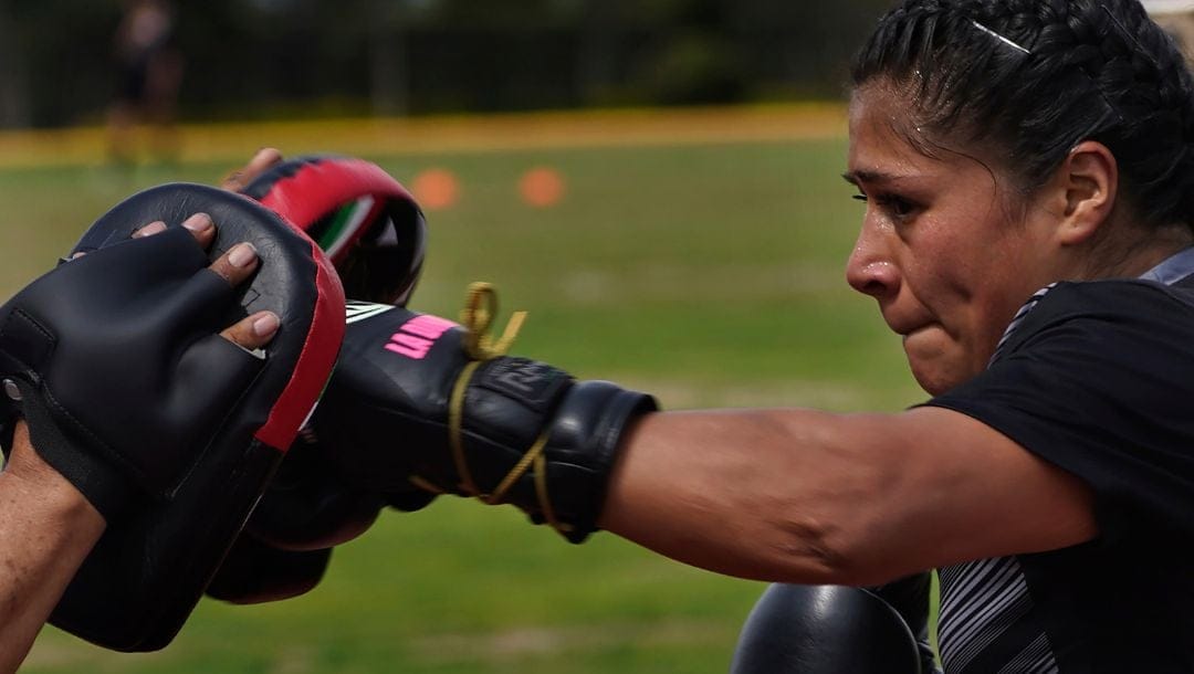 Erika 'Dinamita' Cruz, a World Boxing Association featherweight champion and a member of Mexico's National Guard.