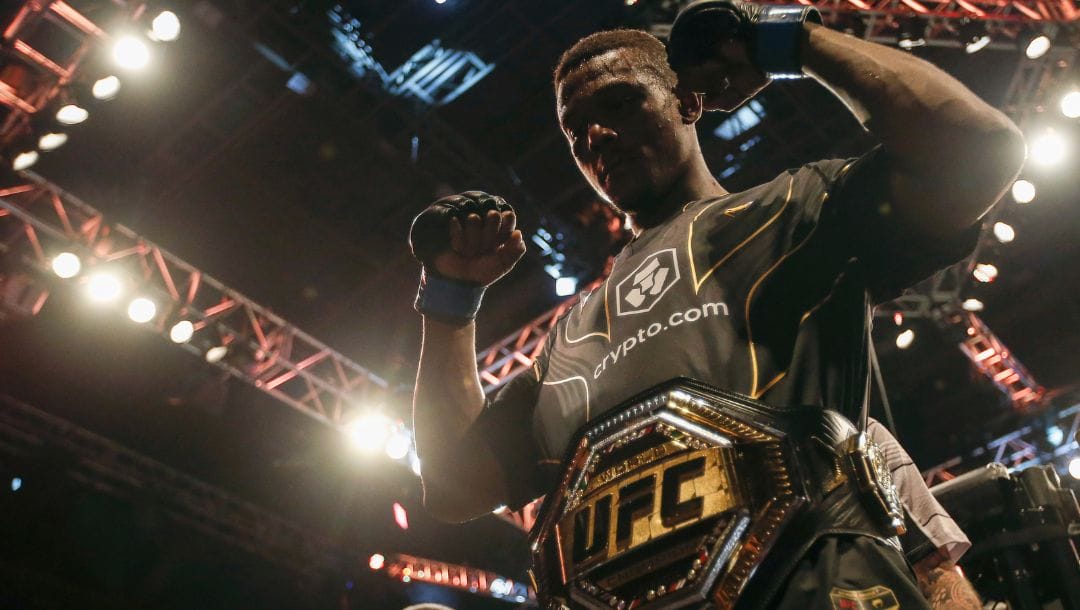 Jamahal Hill, of the U.S., celebrates his victory over Brazil's Glover Teixeira in their light heavyweight title bout.
