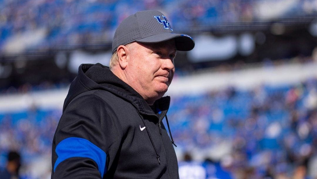 Kentucky head coach Mark Stoops waits for his senior players to come out during Kentucky's senior day celebration before an NCAA college football game against New Mexico State in Lexington, Ky., Saturday, Nov. 20, 2021.