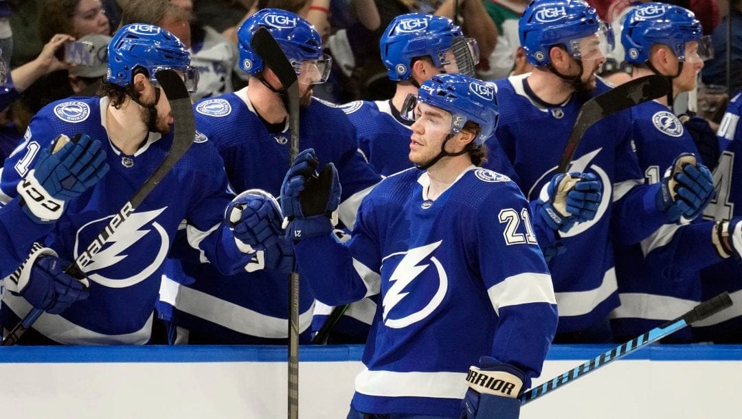 Tampa Bay Lightning center Brayden Point (21) celebrates his goal against the San Jose Sharks with the bench during the first period of an NHL hockey game Tuesday, Feb. 7, 2023, in Tampa, Fla.