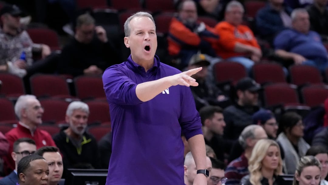 Northwestern head coach Chris Collins directs his team during the first half of an NCAA college basketball game against the Penn State at the Big Ten men's tournament, Friday, March 10, 2023, in Chicago. (AP Photo/Charles Rex Arbogast)