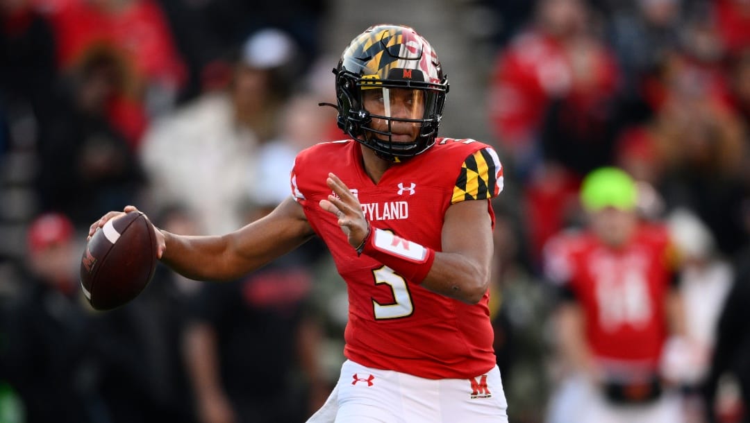 FILE - Maryland quarterback Taulia Tagovailoa (3) plays during the first half of an NCAA college football game against Ohio State, Saturday, Nov. 19, 2022, in College Park, Md. Taulia Tagovailoa announced Wednesday, Jan. 18, 2023, he is returning to Maryland to play next season. Taulia Tagovailoa is the brother of Miami Dolphins quarterback Tua Tagovailoa. (AP Photo/Nick Wass, File)