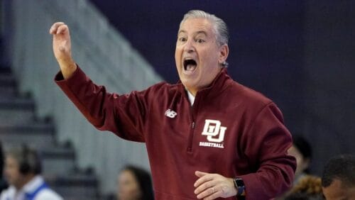 Denver head coach Jeff Wulbrun yells to his team during the first half of an NCAA college basketball game against UCLA Saturday, Dec. 10, 2022, in Los Angeles.