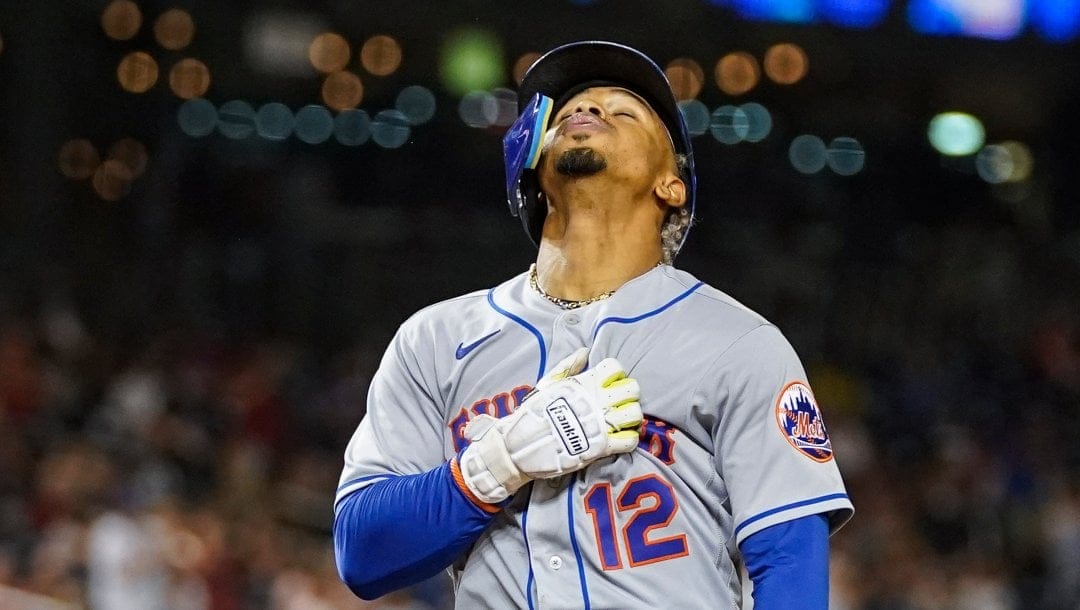 New York Mets' Francisco Lindor (12) celebrates his three-run homer during the sixth inning of a baseball game against the Washington Nationals at Nationals Park, Monday, Aug. 1, 2022, in Washington.